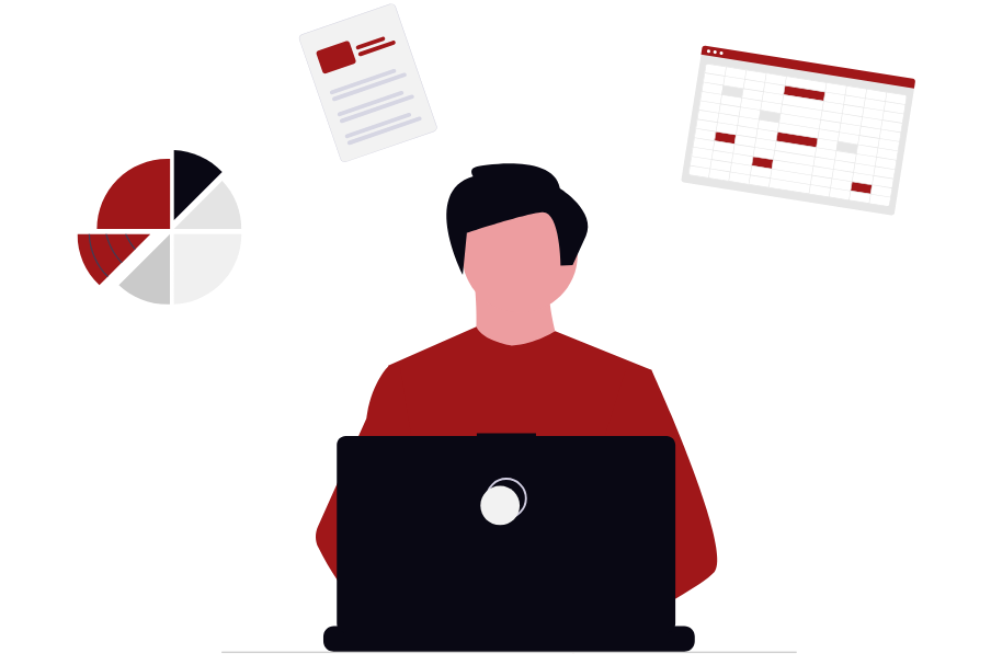 A man sits in front of a computer, with data charts visible behind him.