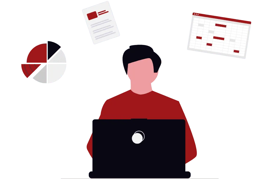 A man sits in front of a computer, with data charts visible behind him.